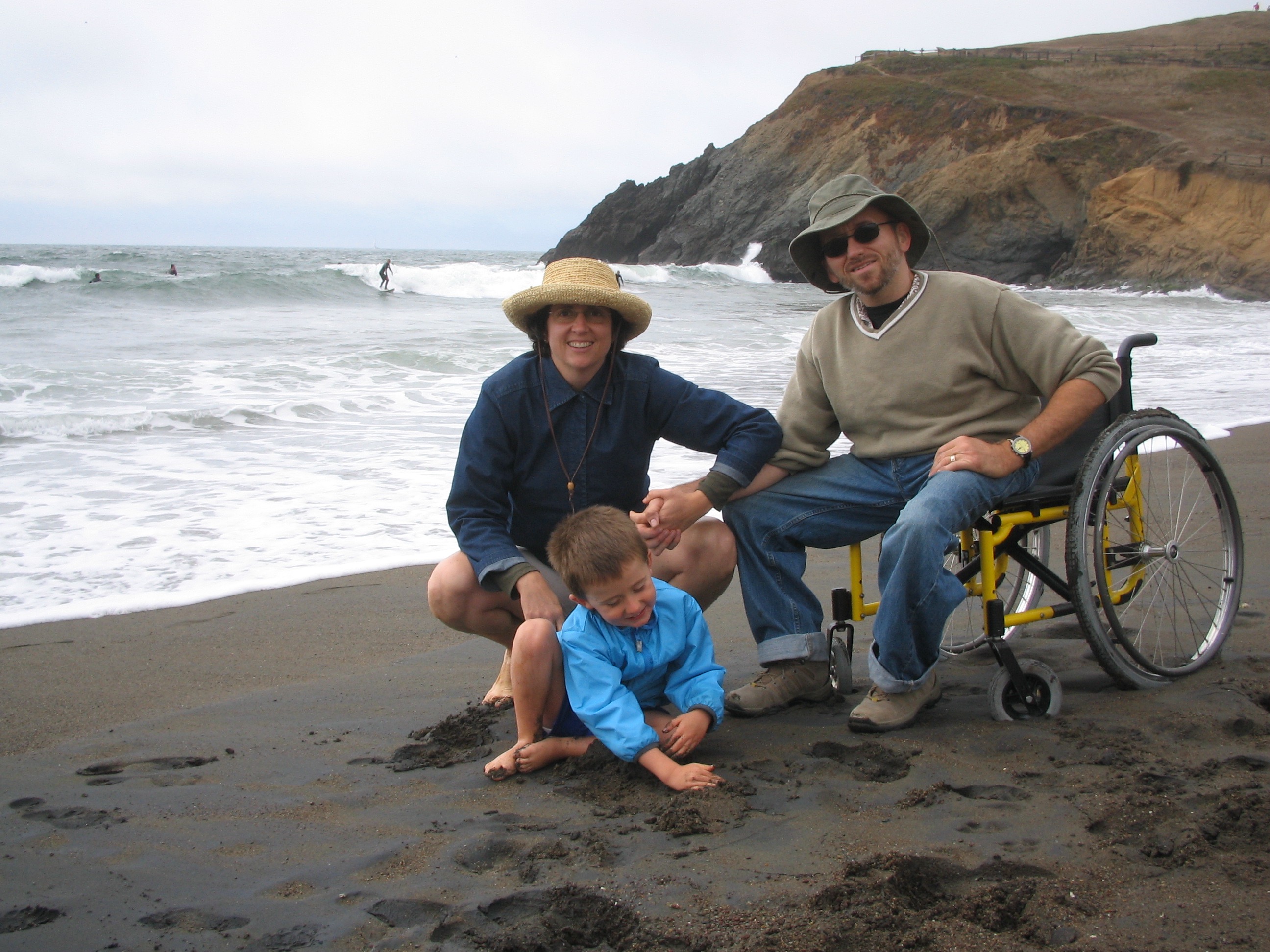 Erick with his family at the beach
