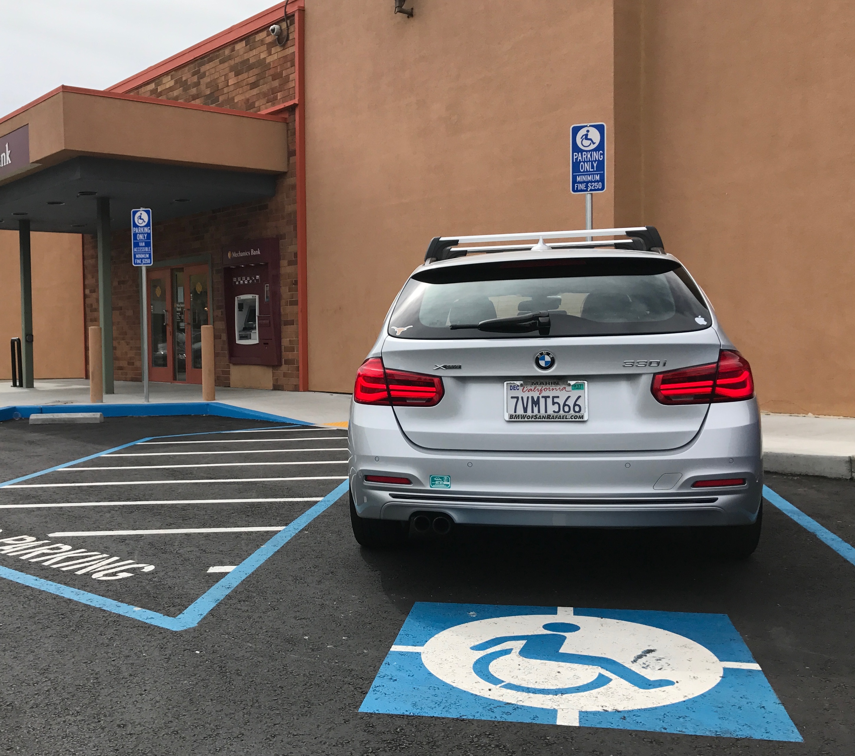 Active ISA painted on a California bank parking lot