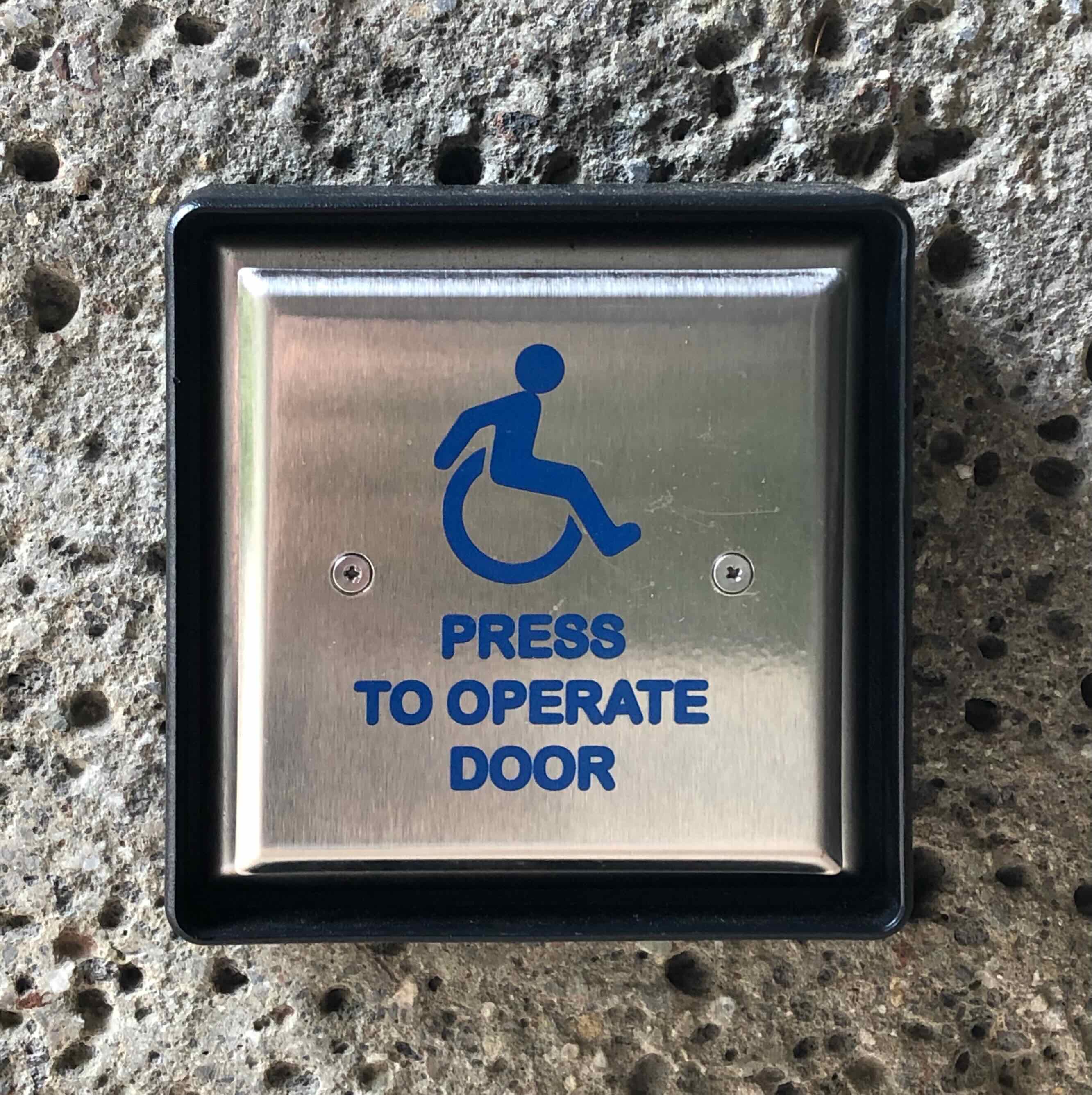 Door activation button bearing the Active ISA